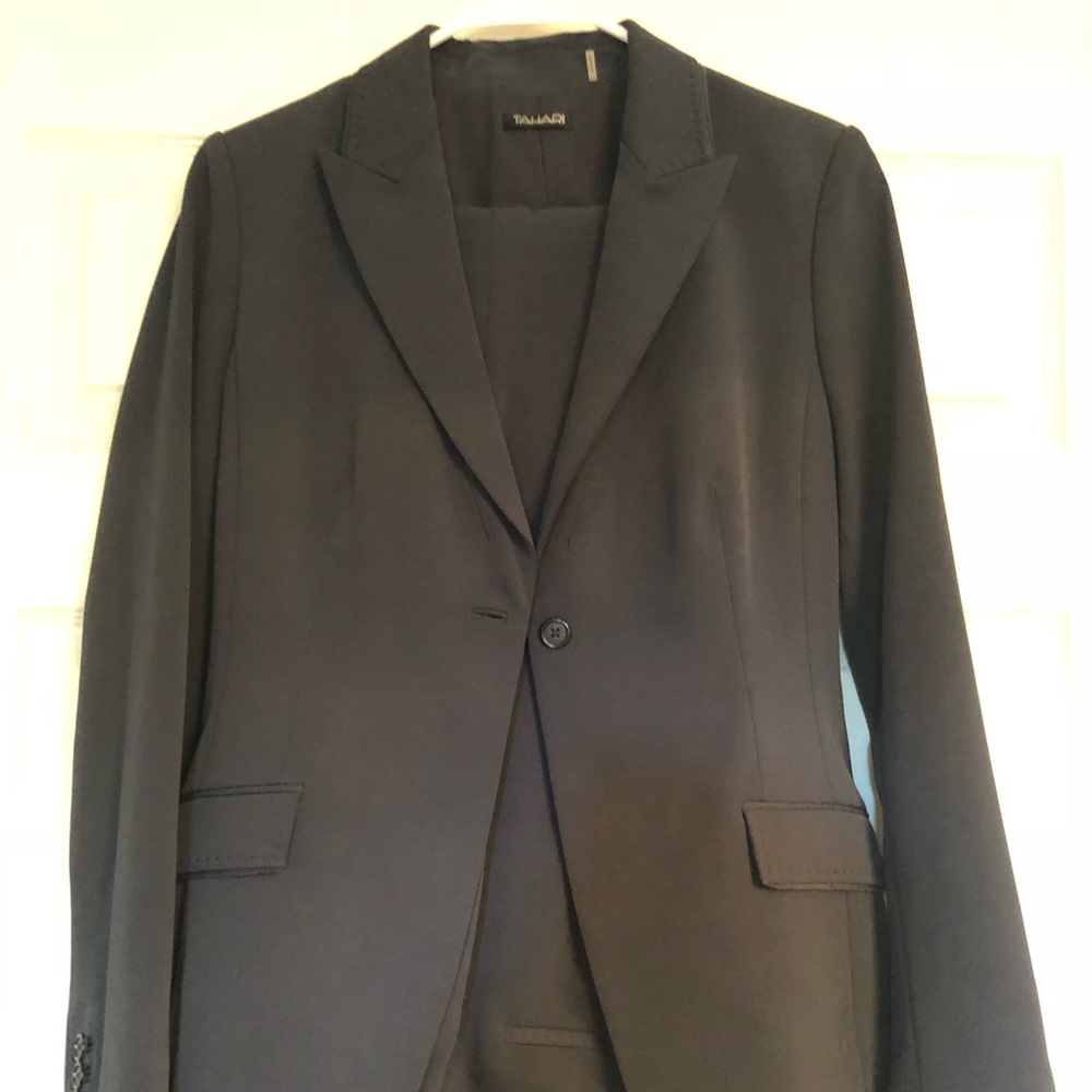 Tahari navy blue woman’s suit.